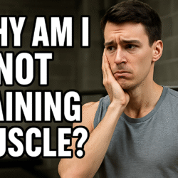 Frustrated young man in a gym wondering why he’s not gaining muscle